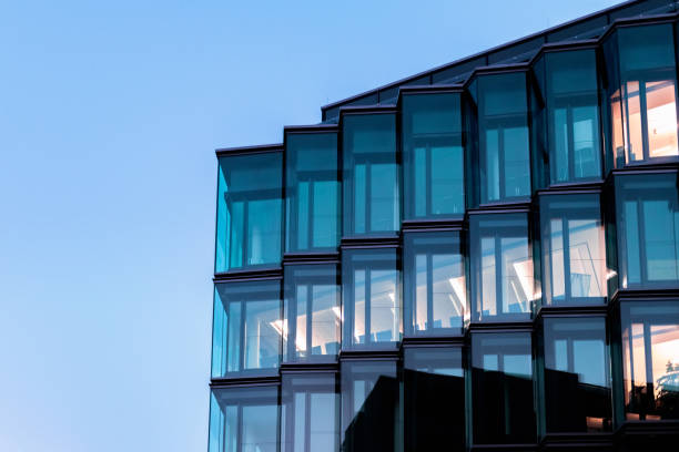 Modern institutional building facade with geometric glass windows